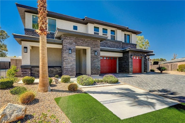 7736 Tioga Ridge Ct, Las Vegas, NV 89117 - prairie-style home featuring stucco siding, stone siding, a garage, and decorative driveway