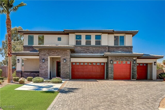 7736 Tioga Ridge Ct, Las Vegas, NV 89117 - prairie-style house with stucco siding, a garage, stone siding, and decorative driveway