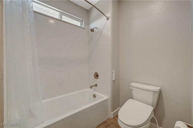 7736 Tioga Ridge Ct, Las Vegas, NV 89117 - bathroom with shower / bathtub combination with curtain and wood finished floors