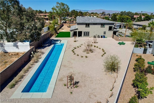 7736 Tioga Ridge Ct, Las Vegas, NV 89117 - view of pool featuring a fenced backyard, a mountain view, and a patio