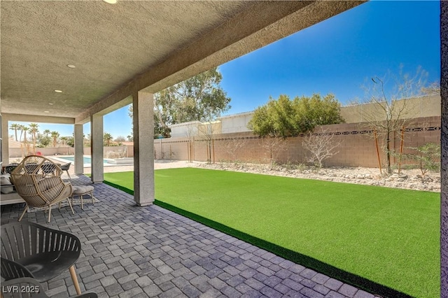 7736 Tioga Ridge Ct, Las Vegas, NV 89117 - fenced backyard with a patio
