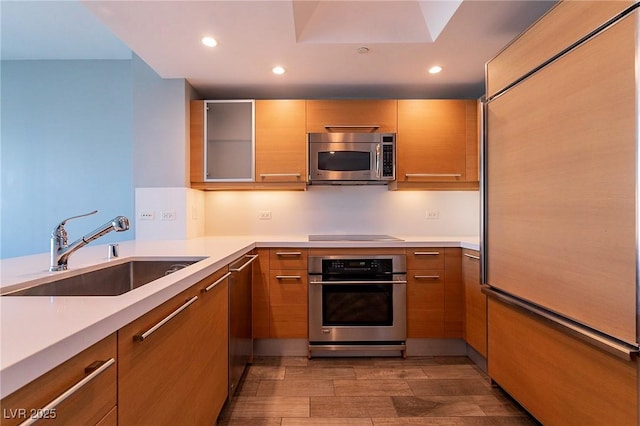 222 Karen Ave Unit 2804, Las Vegas, NV 89109 - kitchen featuring stainless steel appliances, light countertops, modern cabinets, and recessed lighting