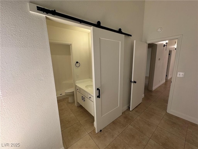 2318 El Molino Cir, Las Vegas, NV 89108 - bathroom with tile patterned floors, vanity, and a shower