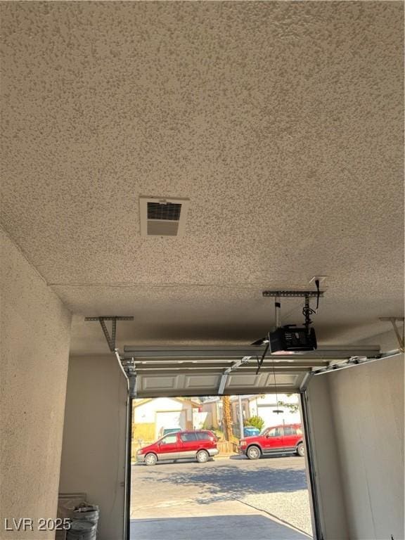 2318 El Molino Cir, Las Vegas, NV 89108 - garage featuring a garage door opener