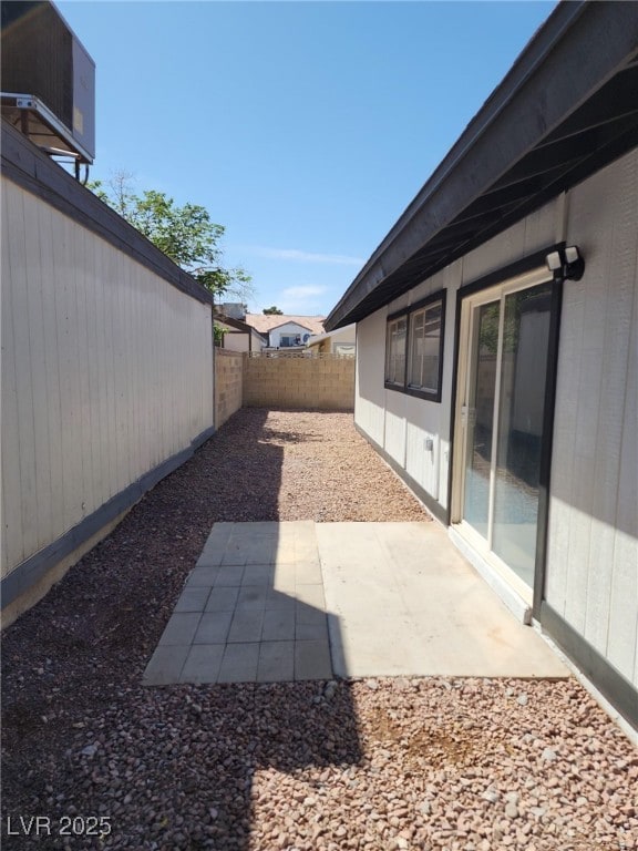 2318 El Molino Cir, Las Vegas, NV 89108 - fenced backyard with a patio area