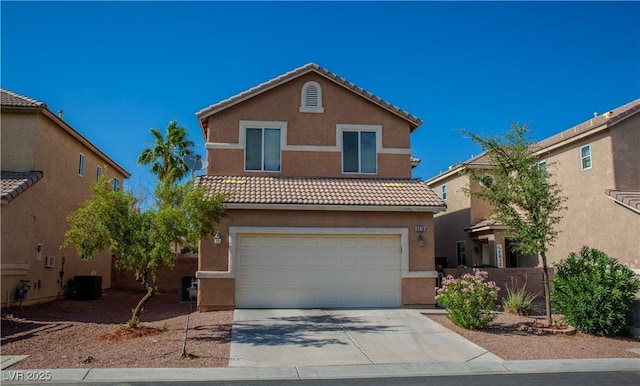 5216 Loma Verde Ave, Las Vegas, NV 89108 - traditional home featuring stucco siding, driveway, and a garage