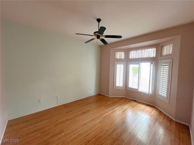 2925 Big Green Ln, Las Vegas, NV 89134 - unfurnished room featuring light wood-style floors and a ceiling fan