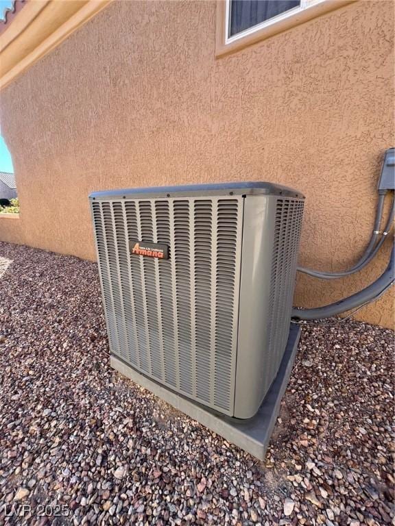 2925 Big Green Ln, Las Vegas, NV 89134 - exterior view of a cooling unit and stucco siding