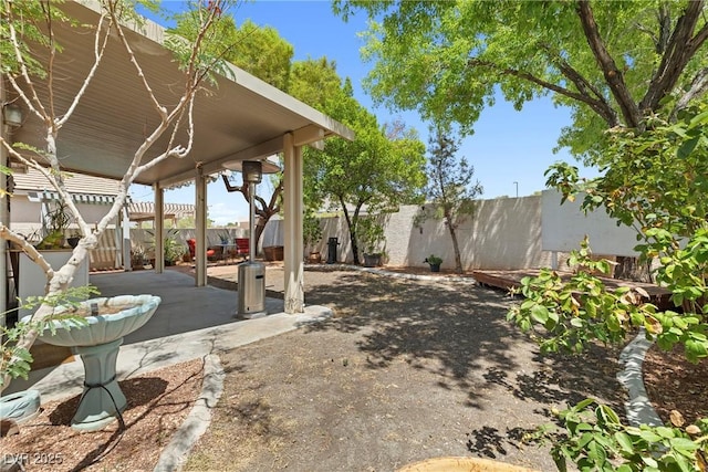 981 Leadville Meadows Dr, Henderson, NV 89052 - fenced backyard featuring a patio area