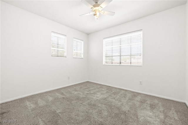 981 Leadville Meadows Dr, Henderson, NV 89052 - carpeted empty room featuring plenty of natural light and a ceiling fan