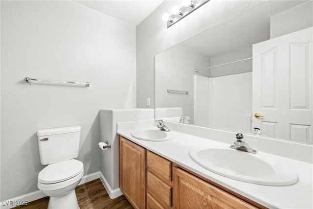981 Leadville Meadows Dr, Henderson, NV 89052 - full bath featuring double vanity, wood finished floors, and a shower