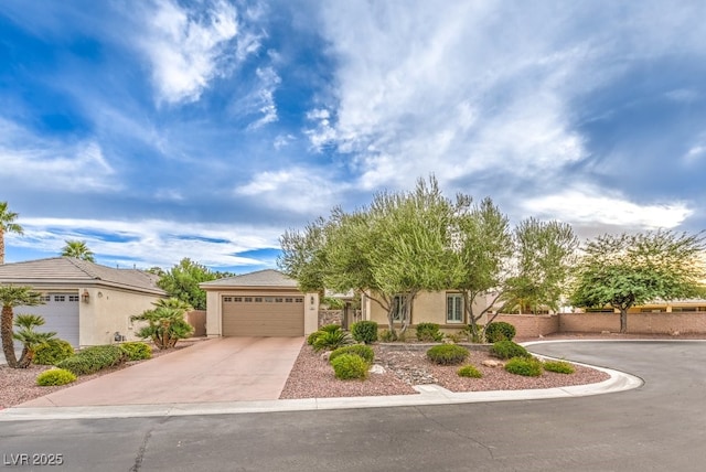 8633 Kennedy Heights Ct, Las Vegas, NV 89131 - view of front of home with driveway, stucco siding, and a garage