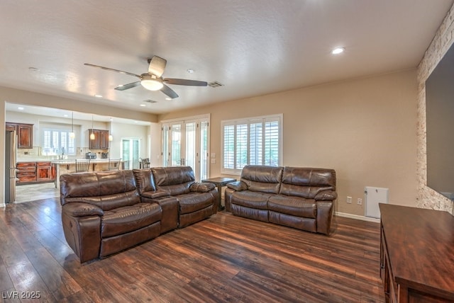 8633 Kennedy Heights Ct, Las Vegas, NV 89131 - living area with dark wood-style flooring, ceiling fan, and recessed lighting