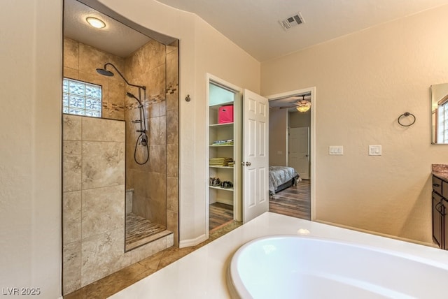 8633 Kennedy Heights Ct, Las Vegas, NV 89131 - full bath with tiled shower, vanity, a ceiling fan, ensuite bathroom, and a tub to relax in