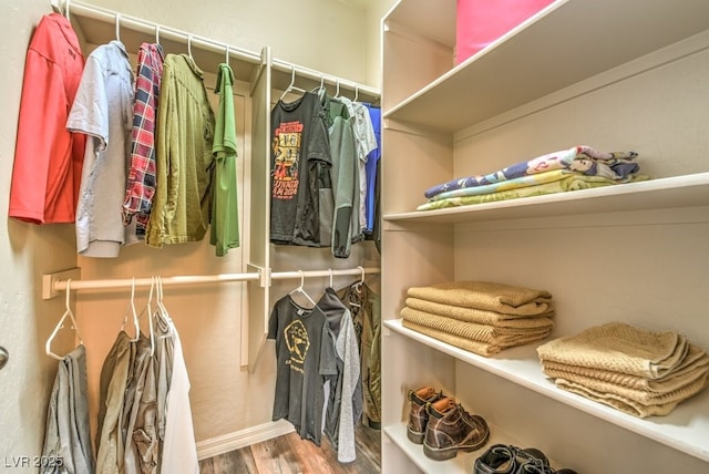 8633 Kennedy Heights Ct, Las Vegas, NV 89131 - walk in closet featuring wood finished floors