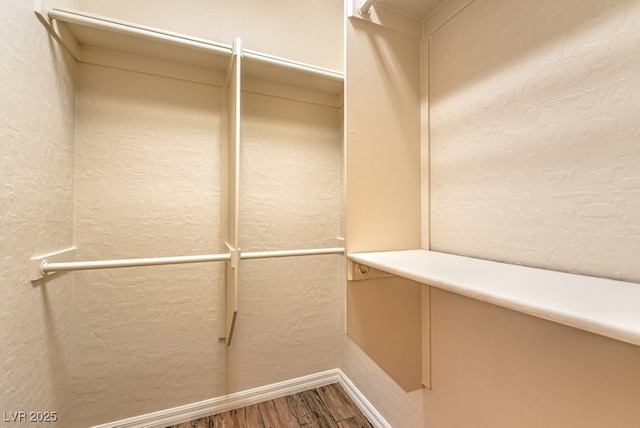8633 Kennedy Heights Ct, Las Vegas, NV 89131 - walk in closet featuring wood finished floors