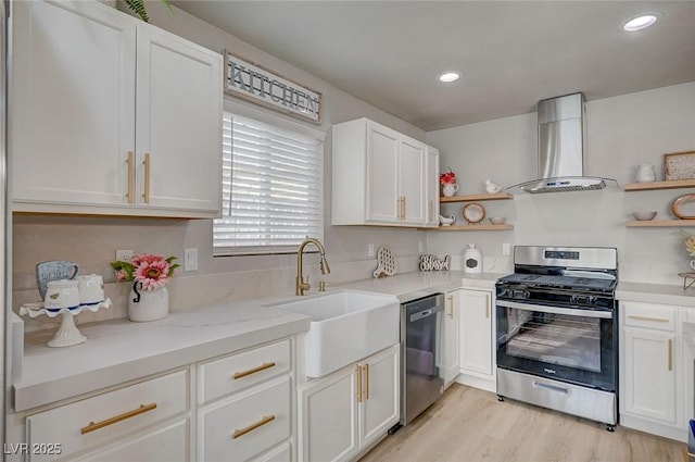 700 Cactus Ln, Las Vegas, NV 89107 - kitchen featuring appliances with stainless steel finishes, island exhaust hood, open shelves, white cabinets, and recessed lighting