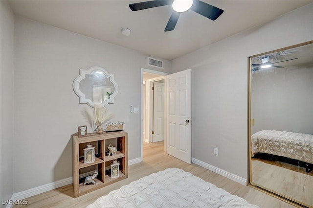 700 Cactus Ln, Las Vegas, NV 89107 - bedroom featuring wood finished floors, ceiling fan, and a closet