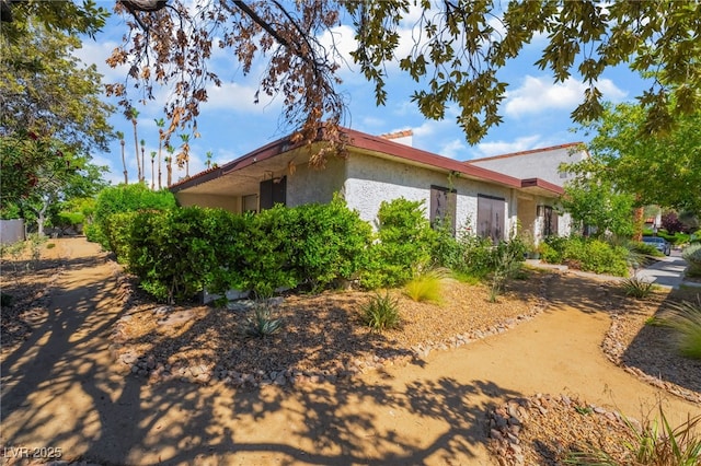 2857 San Lago Ct, Las Vegas, NV 89121 - view of side of property featuring stucco siding