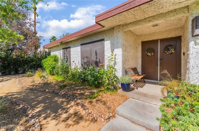 2857 San Lago Ct, Las Vegas, NV 89121 - property entrance with stucco siding