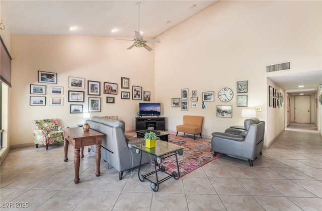 2857 San Lago Ct, Las Vegas, NV 89121 - living room with high vaulted ceiling, light tile patterned floors, ceiling fan, and recessed lighting