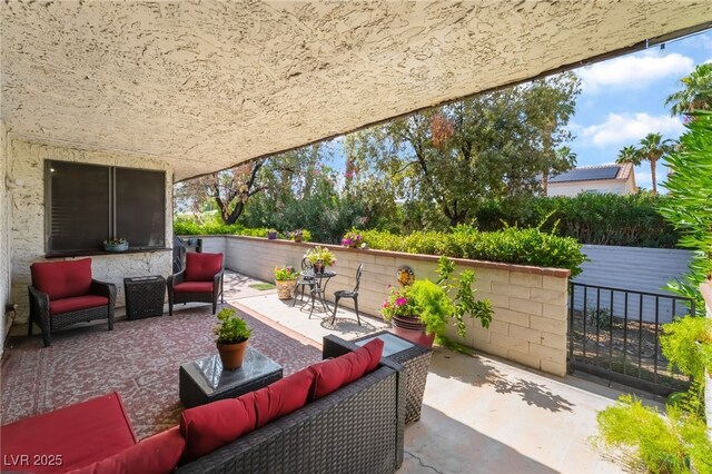 2857 San Lago Ct, Las Vegas, NV 89121 - view of patio / terrace featuring an outdoor hangout area