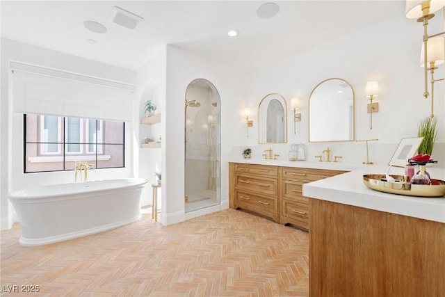 1990 Country Cove Ct, Las Vegas, NV 89135 - bathroom featuring a shower stall, double vanity, a soaking tub, and recessed lighting