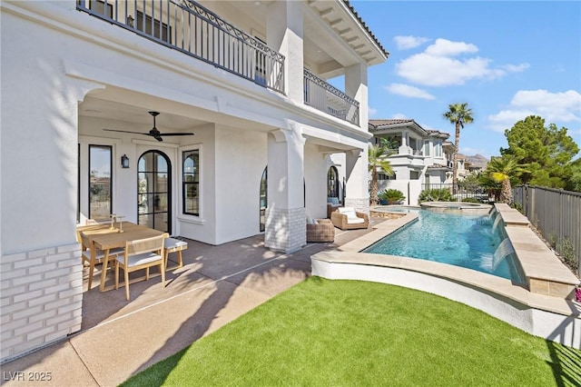 1990 Country Cove Ct, Las Vegas, NV 89135 - view of pool featuring a patio area, ceiling fan, and a pool with connected hot tub