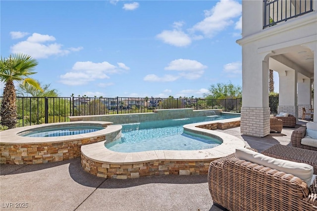 1990 Country Cove Ct, Las Vegas, NV 89135 - view of swimming pool with a fenced backyard, a pool with connected hot tub, and a patio