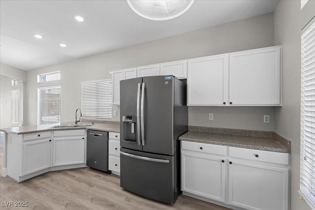 10613 Tiffanieville Ct, Las Vegas, NV 89129 - kitchen with stainless steel refrigerator with ice dispenser, dishwasher, white cabinets, and recessed lighting