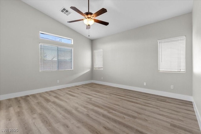 10613 Tiffanieville Ct, Las Vegas, NV 89129 - empty room featuring vaulted ceiling, ceiling fan, and wood finished floors