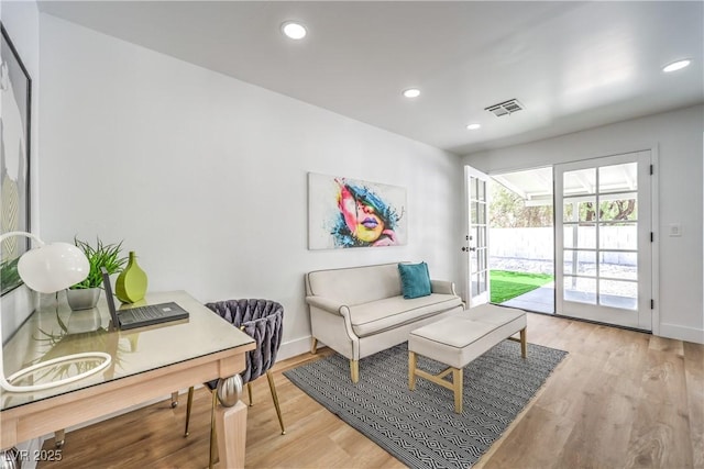 3104 Waterview Dr, Las Vegas, NV 89117 - living room with light wood-type flooring, recessed lighting, and a desk