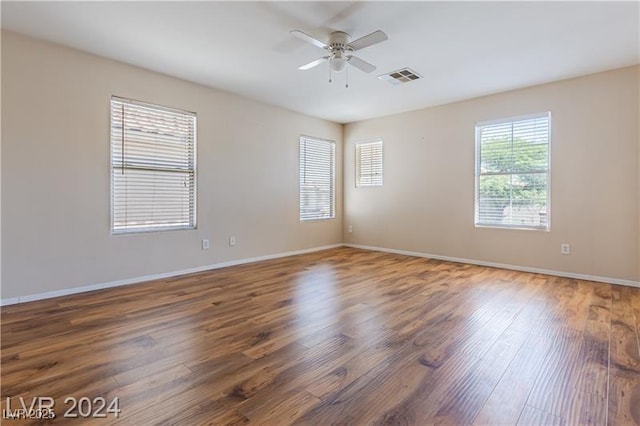 11577 Vesuvio Ct, Las Vegas, NV 89183 - unfurnished room with wood finished floors and ceiling fan