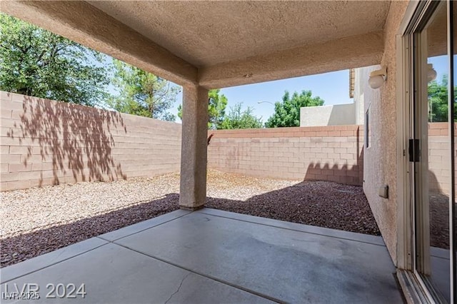 11577 Vesuvio Ct, Las Vegas, NV 89183 - fenced backyard with a patio