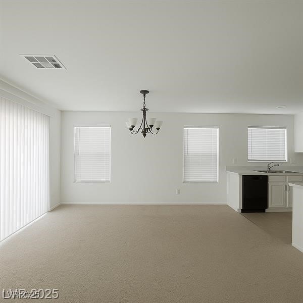 520 Shire Hall St, Las Vegas, NV 89178 - unfurnished dining area featuring a chandelier and light carpet