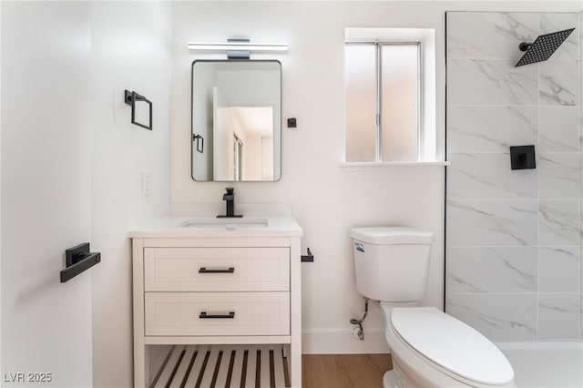 3915 Delling Ct, Las Vegas, NV 89104 - full bath with vanity, a marble finish shower, and wood finished floors