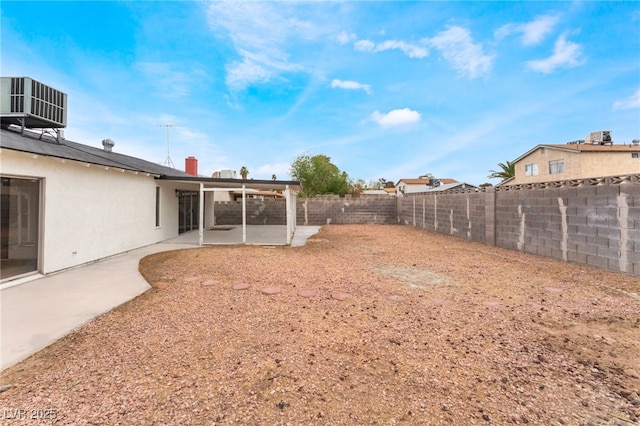 3915 Delling Ct, Las Vegas, NV 89104 - fenced backyard with a patio