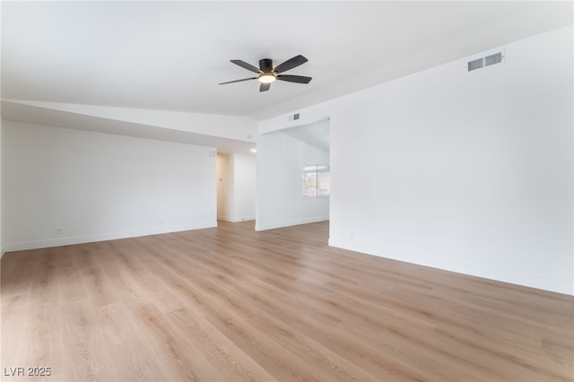 3915 Delling Ct, Las Vegas, NV 89104 - spare room featuring a ceiling fan, light wood-style floors, and lofted ceiling