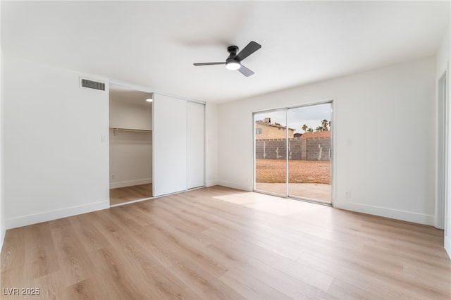 3915 Delling Ct, Las Vegas, NV 89104 - unfurnished bedroom with access to exterior, light wood finished floors, and a ceiling fan