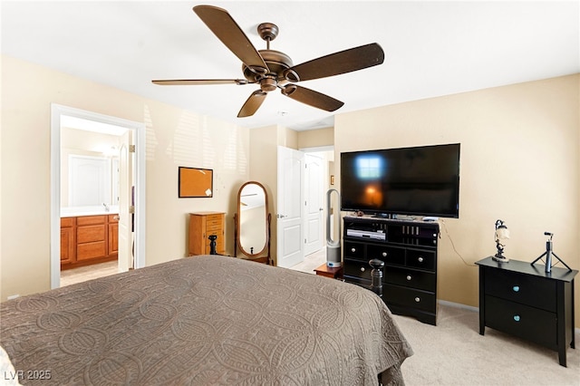 8316 Mokena Ave, Las Vegas, NV 89178 - bedroom with light colored carpet, ensuite bath, and ceiling fan