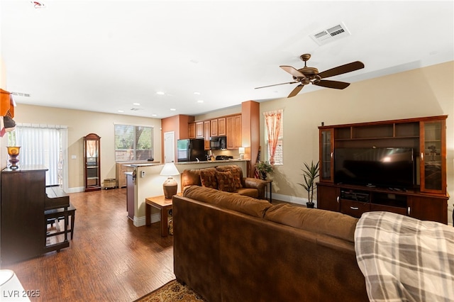 8316 Mokena Ave, Las Vegas, NV 89178 - living room featuring dark wood-style floors, a ceiling fan, and recessed lighting