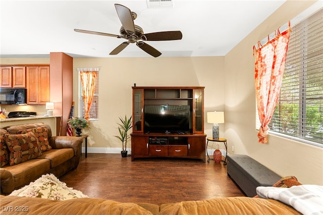 8316 Mokena Ave, Las Vegas, NV 89178 - living area with dark wood finished floors and a ceiling fan