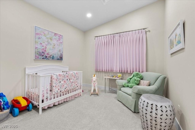 3104 Conners Dr, Las Vegas, NV 89107 - carpeted bedroom with a crib and recessed lighting