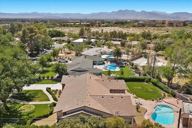3104 Conners Dr, Las Vegas, NV 89107 - view from above of property featuring a pool area and a mountainous background