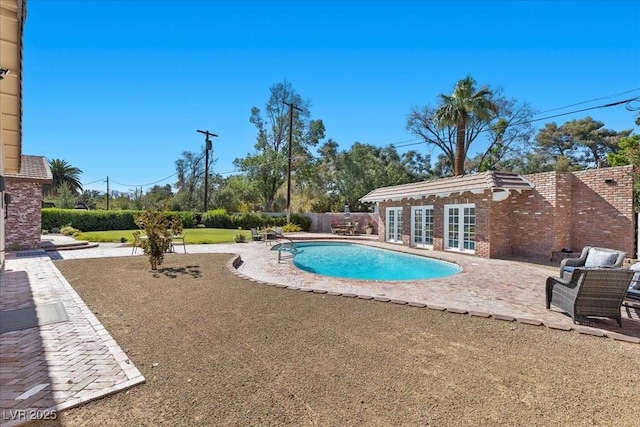 3104 Conners Dr, Las Vegas, NV 89107 - view of swimming pool with a patio area and french doors
