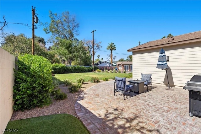 3104 Conners Dr, Las Vegas, NV 89107 - fenced backyard featuring a patio area and a grill