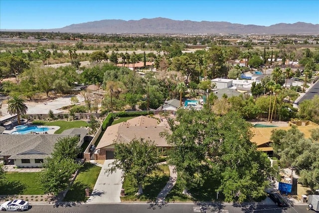 3104 Conners Dr, Las Vegas, NV 89107 - aerial overview of property's location featuring a mountainous background and nearby suburban area