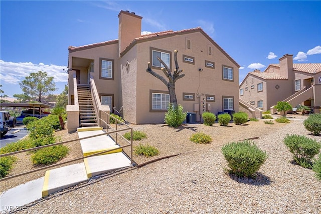 3455 Erva St Unit 112, Las Vegas, NV 89117 - view of building exterior featuring stairway