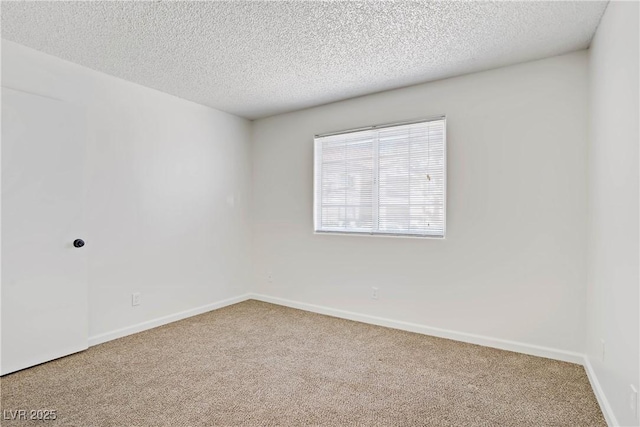 3455 Erva St Unit 112, Las Vegas, NV 89117 - spare room with carpet and a textured ceiling