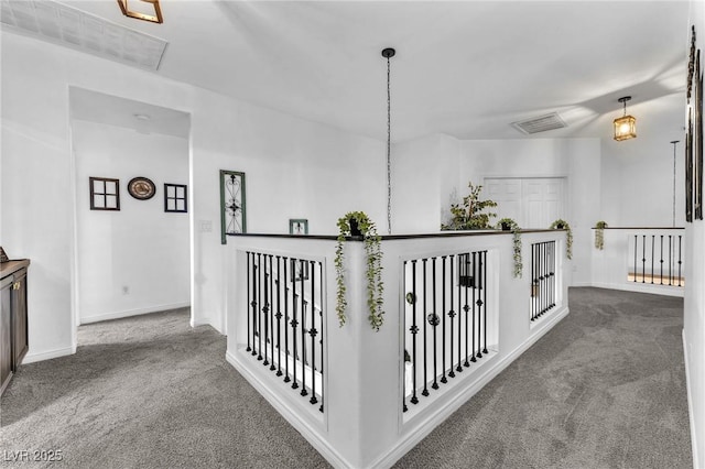 10654 Sidlaw Hills Ct, Las Vegas, NV 89141 - corridor with carpet floors and an upstairs landing